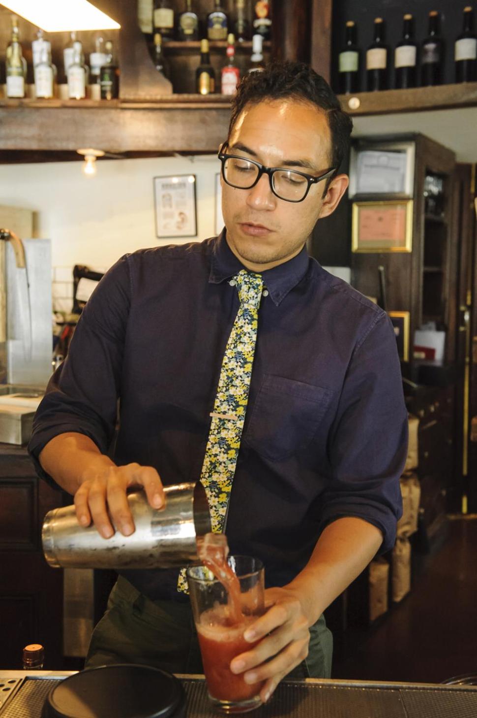 Eating along the G Line. Manager Marc Garza at Sweetleaf on Center Avenue in LIC, Wednesday, June 25, 2014, Queens, NY. (Jeff Bachner/for New York Daily News)