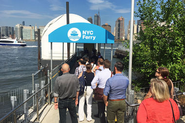  Riders waiting to board the NYC Ferry at the Hunters Point South landing in Long Island City.  