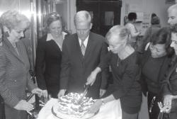 Elected officials and other distinguished guests at the Entrepreneur Spacersquo;s third birthday party in Long Island City feast their eyes on a special Belgian waffle cake cut by Mariepaule Vermersch, who worked at her familyrsquo;s Belgian waffle stand during the 1964-65 Worldrsquo;s Fair. Shown with Vermersch are (from left to right) Queens Economic Development Corporation President Seth Bornstein, Kathrine Gregory of the Entrepreneur Space, Queens Borough President Melinda Katz, City Council Member Jimmy Van Bramer, and Emily Lin, Lara Sokol and Gail Roseman. 